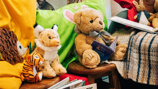 Soft toys reading books for World Book Day 2026